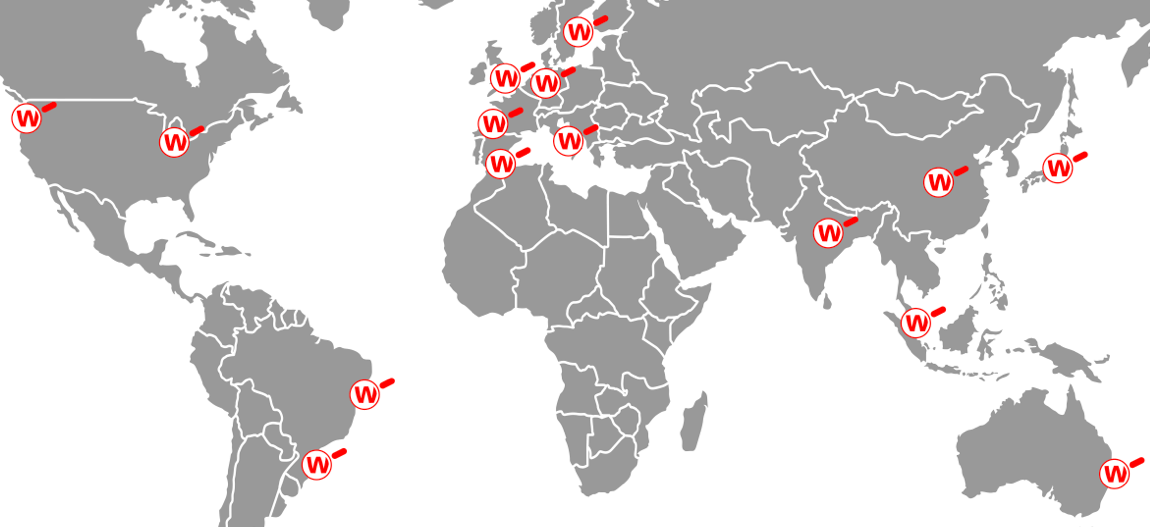 Mappa del mondo con lenti d'ingrandimento rosse WatchGuard che indicano dove lavoriamo