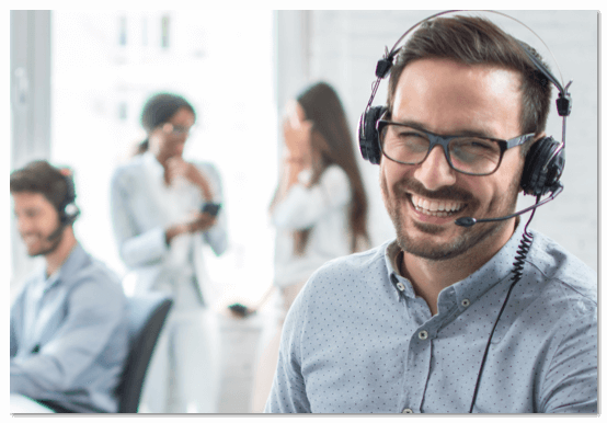Smiling tech support rep with a headset on