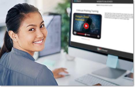 Smiling asian woman showing the phishing training video on her monitor